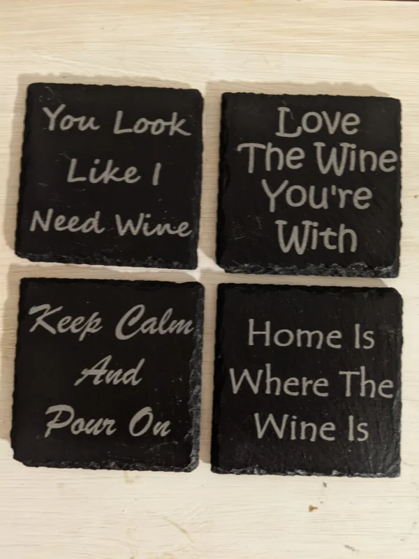 Set of 4 handmade engraved slate coasters.